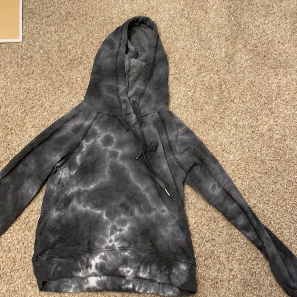 grey and white sweatshirt